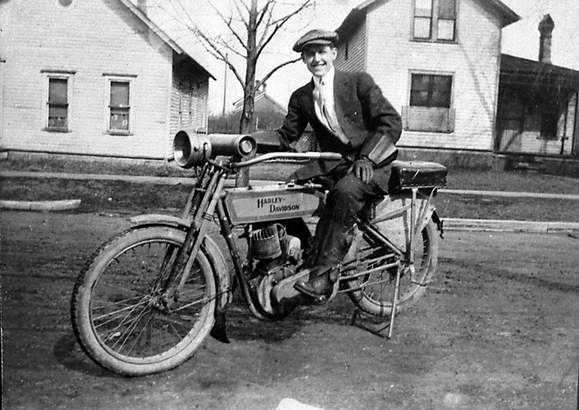 Another proud Harley owner, circa 1914. Love the leather leggings and gloves. View full size.

