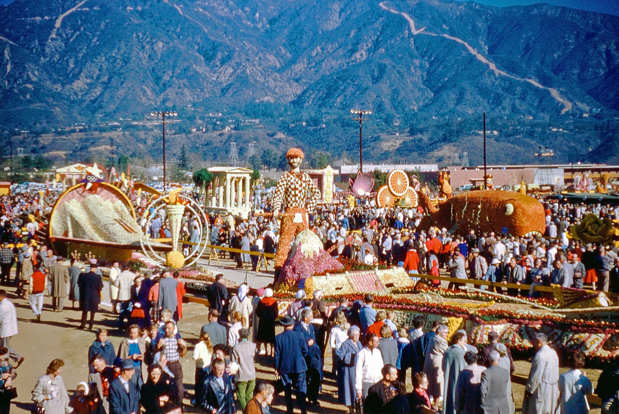 From a large batch of found slides comes this Kodachrome slide of Rose Parade floats in a park. The slide mount has a date stamp of Sept. 61. View full size.