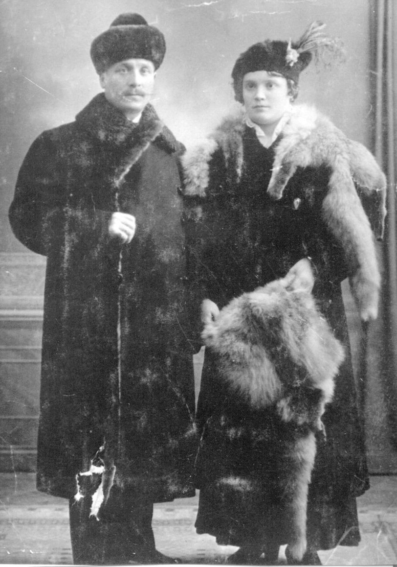 These are my mother's mother's parents around 1910, taken in Russia. I don't know much about them but with all the furs they are wearing they must have been well off or it was cold in the studio. I have very few photos from my mother's side of the family. View full size.
