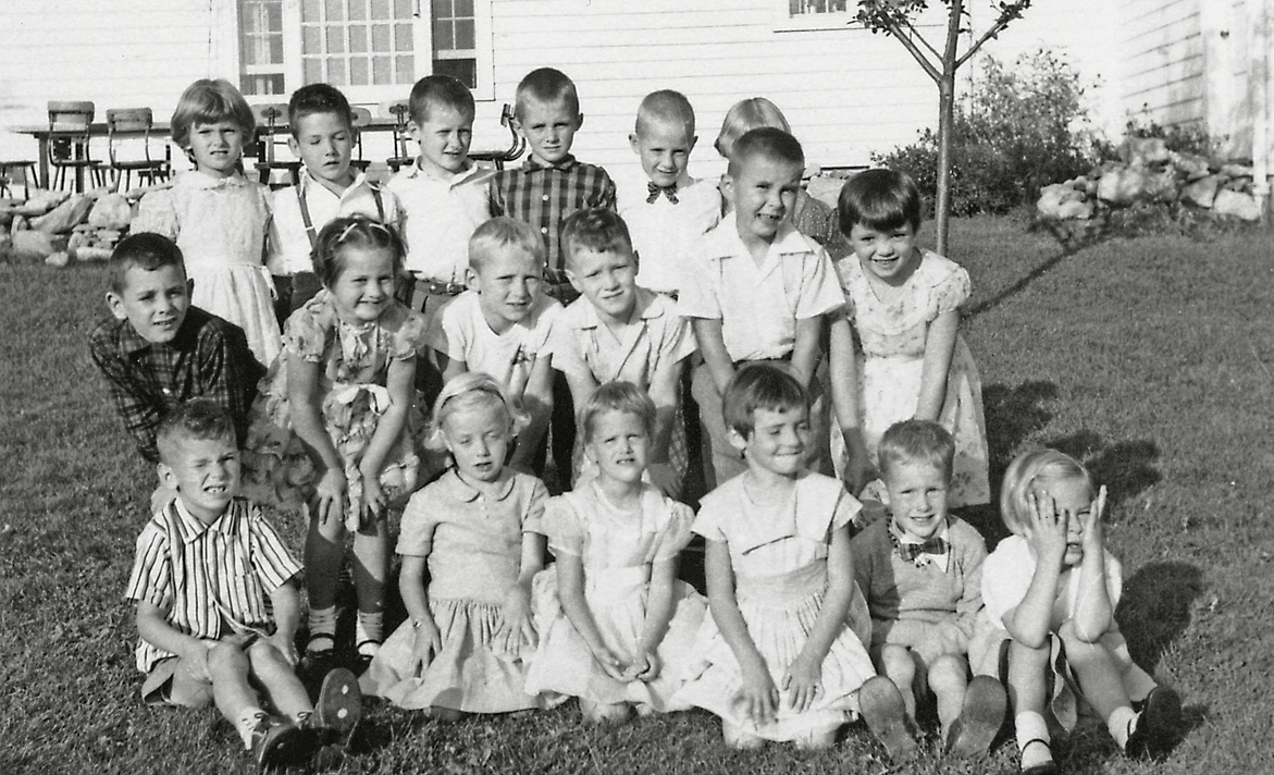 Dad set up this shot at my 7th birthday party in the fall of 1957, with all of my attending friends in the shot. There were hot dogs, hamburgers and birthday cake, but no "loot bags." View full size.