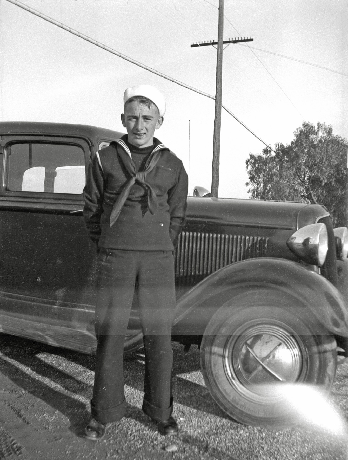 And either some bad light leakage or something went flying by in front of the camera. I'm guessing early 40s, possibly after Dec 7, 1941. From the negatives I found at a Whittier book store. View full size.