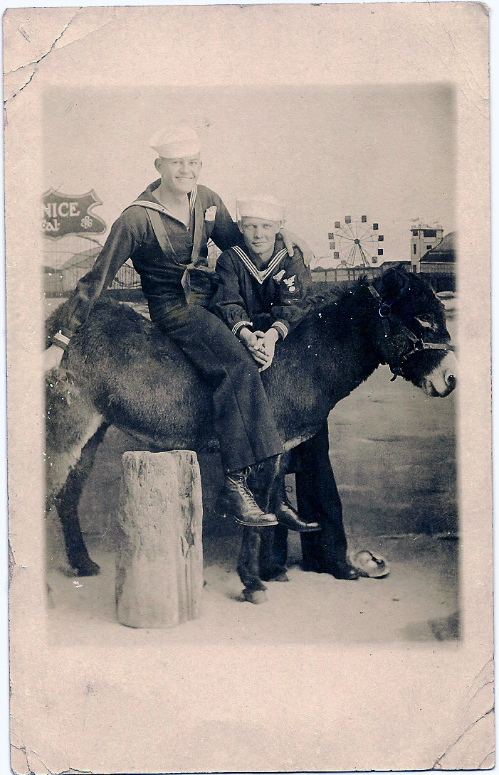 Ted R. Jay (on burro), c. 1917-1918, possibly San Pedro, CA. This faded picture postcard was taken while Ted served in the U.S. Navy in WWI. He served on the USS Bear, a famous ship that had previously played a central role in rescuing the ill-fated Greeley expedition in 1884 and served hazardous duty in the Bering Sea in the Revenue Cutter Service and later sailed to Antarctica with Admiral Byrd. View full size.