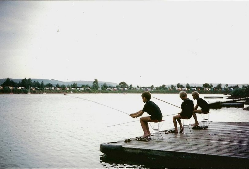 My brothers and me (I'm in the middle) with our home-made fishing rods on holiday in West Germany, August, 1970. View full size.
