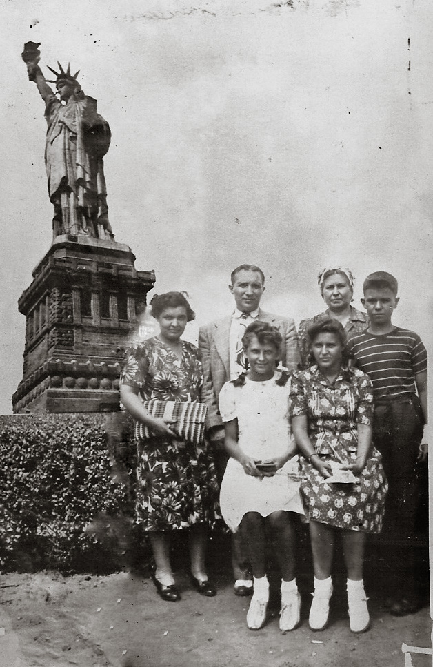 This is a family visit to the Statue of Liberty in 1940. Pictured left to right, my Great Aunt Caditha, Great Uncle Avalino, my grandmother Felismina, and my father Manny. I'm not sure who the young girl in white is. The other young girl is my godmother and father's cousin, Teresa. My family did not immigrate from Spain via Ellis Island. They came via Cuba to Miami in the '20s and '30s. View full size.
