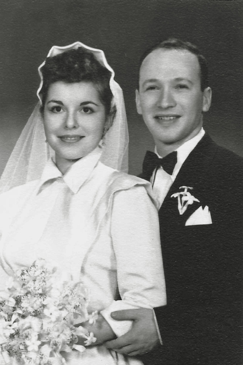 A now 21-year-old Arlene poses on her wedding day with Howard, her groom. They will become my mother and father in 1954.