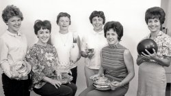These ladies were members of the Fort Knox, Kentucky Officers' Wives Club. My mother, far right, was the only one whose husband was in the Marine Corps. The rest were the wives of Army officers. Their role then, as now, was much more than just bowling and having luncheons. View full size.