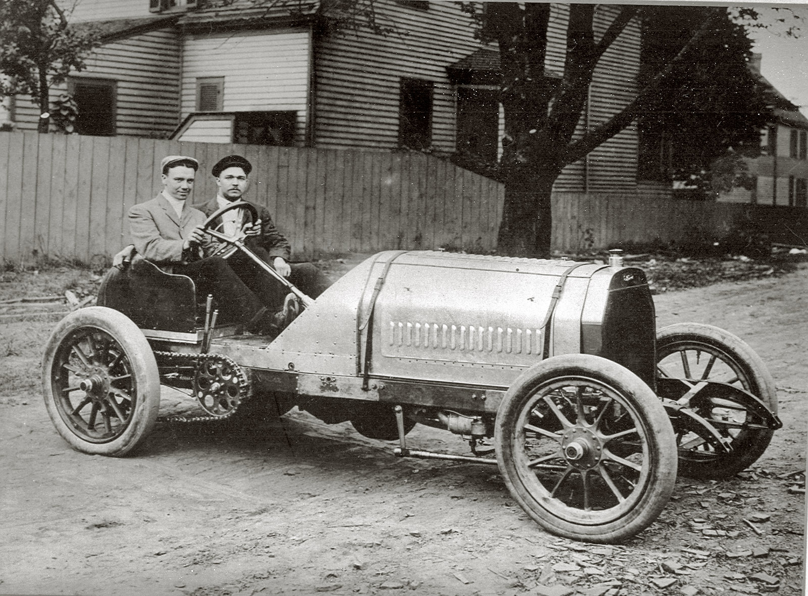 Famous NY-Paris 1908 race driver Montague Roberts (left) with brother Mortimer Roberts, who was a race car driver as well. Here they are in their racecar known as "The Donkey." View full size.