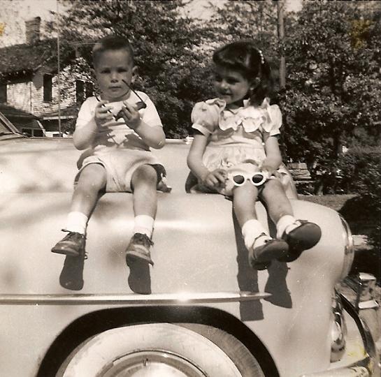 My 2nd cousins, I just think this is a cute picture with the sunglasses and them sitting on the car.