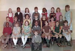 My brother Iden holds the sign for his first grade class picture taken in 1968. View full size.
(ShorpyBlog, Member Gallery)