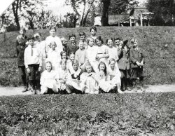 This unmarked photo was in my father's Funeral Book. I believe he is the small blond boy in the middle of the back row; to his left is my Uncle Billy with the dark hair. The annual summer outing that the schools and churches had at Ross Park on the south side of Binghamton, New York. The school was called Rossville School by the locals, in reality it was the Longfellow School or PS 13. Most likely my 2 aunts are in this photo as well as some of their cousins. View full size.
(ShorpyBlog, Member Gallery)
