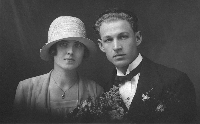 Babicka a Deda, or grandmother and grandfather in English.  This photo of my mother's parents would have been taken sometime in the late 20s. I myself had never seen this until I was in my 40s and it was a shock to me to see my grandparents in a whole new way.  They were young once? Romantic? The whole world in front of them?
I guess we don't see the whole picture, the whole person when our memories from childhood frame them forever, and only the way we see them at the end of their lives.  That is why this site is something of so much value. It gives a glimpse into the past in a way that imagination by itself does not.
They lived full lives, with many ups and downs.  I remember my Grandmother as stern but kind underneath and my Grandfather as someone who loved philosophical discussions and to play chess. 
Each time now, when I look at these old photographs of my family's past, I wonder how much there must be that I didn't and don't know of my heritage because, as so often happens, I was not interested enough when they were still alive and when there was plenty of time. View full size.
