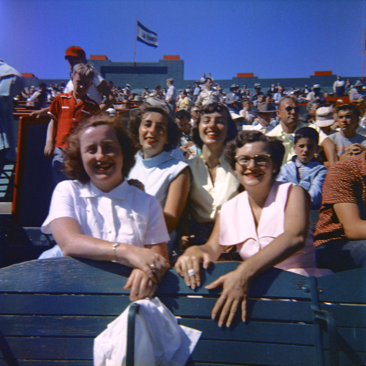 Seals Stadium, San Francisco, August 1953. My sister (third gal from left) and her friends at the ballpark to watch the San Francisco Seals play. Five years later the Giants came to town, and in 1959 Seals Stadium was demolished. From a 2-1/4 square Kodacolor negative. View full size.