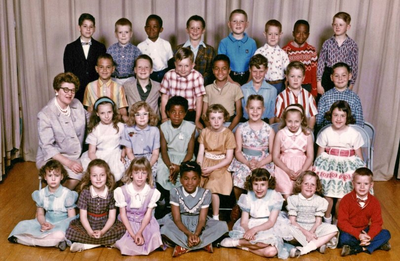 My second grade class at James Buchanan Elementary School, Levittown Pennsylvania, spring 1962. Teacher is Shayndel Sacks (which may have had a different spelling. Her first name was pronounced Shane-Dell, and her last name could have been spelled Sachs). I am the girl seated next to her, wearing the blue headband. At least a third of these same children were in my first grade class. View full size.
