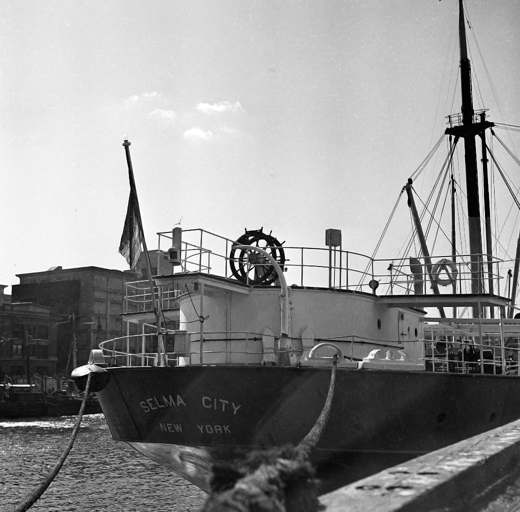 Unknown date and location of this Merchant Marine ship, but I was able to find out its fate which can be read about here. From my negatives collection. View full size.