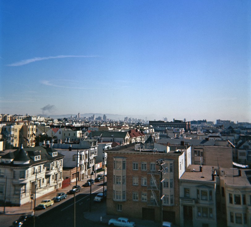 "Baghdad By the Bay" was San Francisco Chronicle columnist Herb Caen's nickname for The City, and the title of his collection of affectionate essays published in 1949. My sister took this nicely-detailed 120 Ektachrome transparency just 5 years later, before the neighborhood Victorians became gentrified and the downtown skyline Manhattanized. The intersection at the lower left is Hayes and Shrader. View full size.
