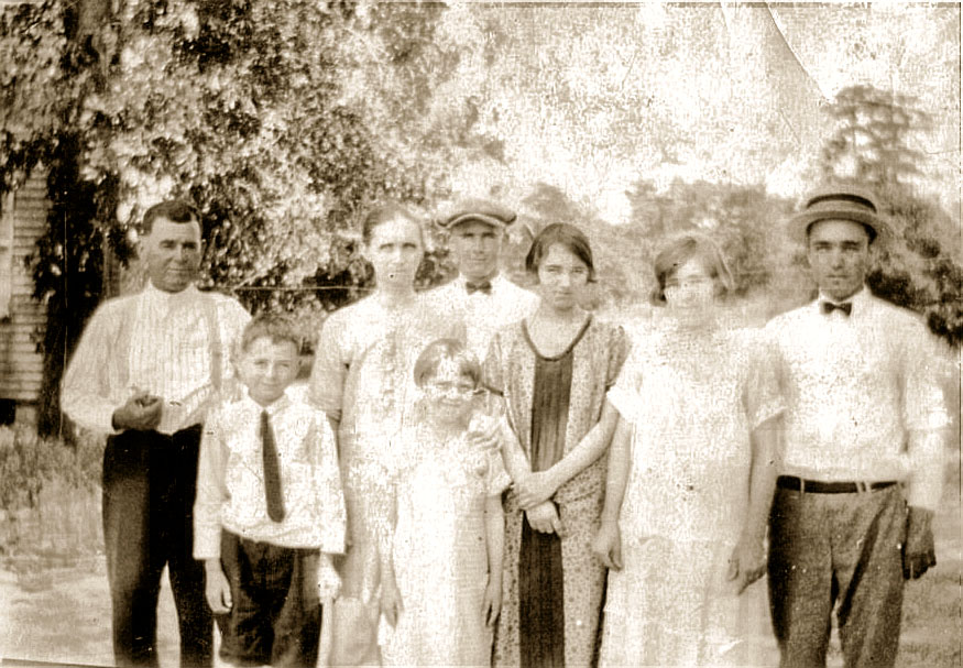About 1910 Simeon Felix Long, Carrie Ellie Long, Harold Long, Sadye Long Smith, Ruth Long Schumpert, Leola Long, Heber Otis Long (11 years old), Karl Long. These are some of the Long and Smith families near Lexington, SC. My grandfather is the youngest boy, Heber Otis Long, who was born in 1899 and died in 1994. He married Flora Ellen Smith and had a son James Long, daughters Anne Blackwell, Betty LaGrone and Joyce Brock. Heber Otis worked for print shops and had his own printing business and finished his career as a linotype operator at the Greenville News in Greenville, SC. in the late 60's.