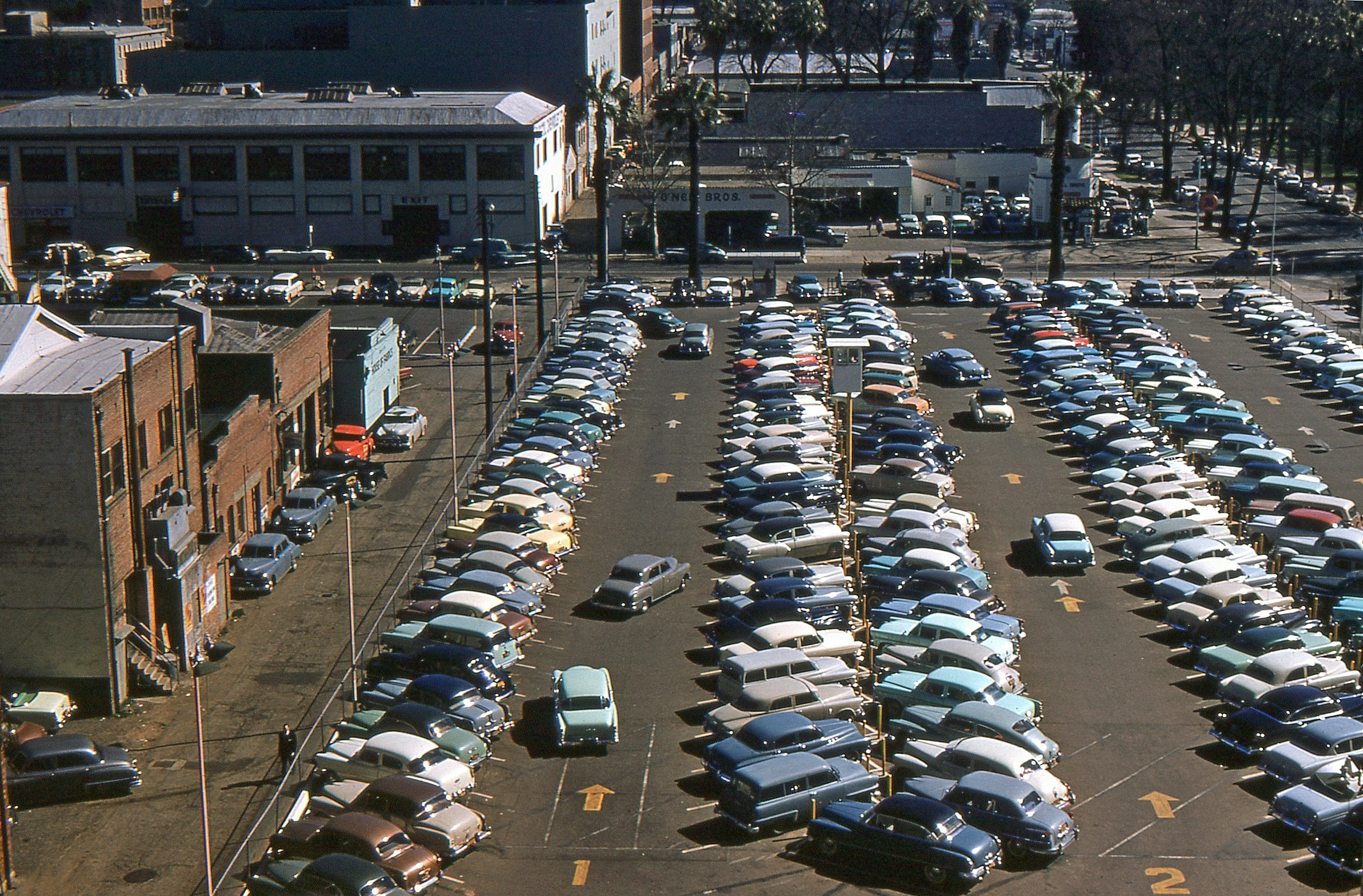 This photo is from my father's trip to Northern California in approximately 1950.  I am hoping that someone who knows cars can come up a more precise date for the picture by noting the date of manufacture of the newest car shown here.  I am almost sure that this parking lot was in downtown Sacramento, but it could have been in San Francisco. View full size.