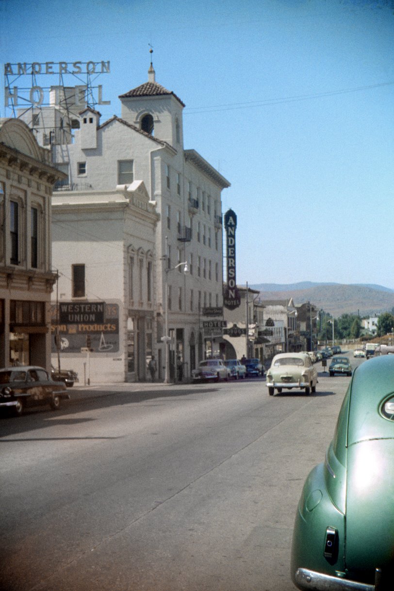 Summer 1955, San Luis Obispo, California. The days when old-looking buildings downtown really were old and Studebakers could roam the streets freely. My brother's Anscochome slide. View full size.
