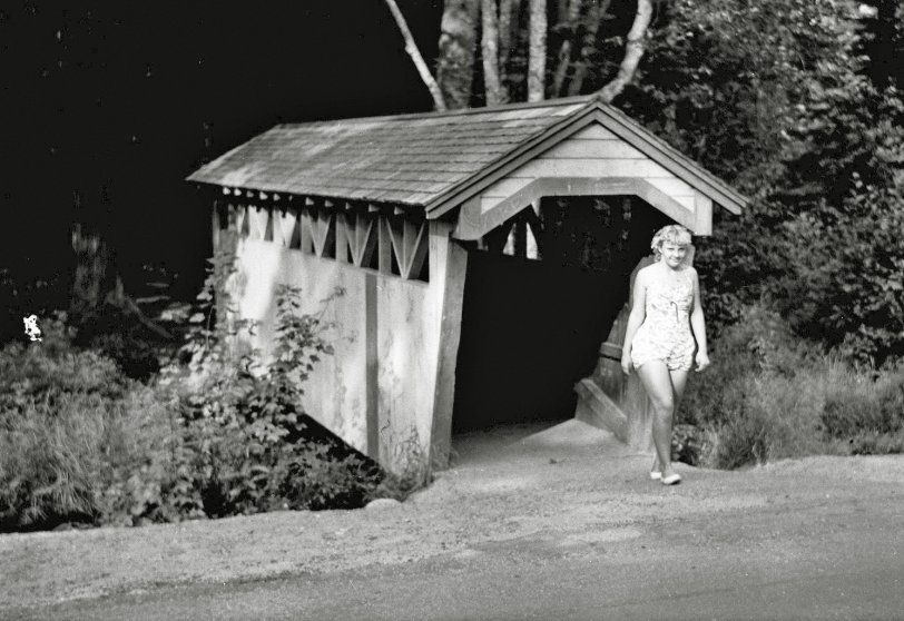 Seriously this one is too small to drive through. Unknown location. From my negatives collection. View full size.
