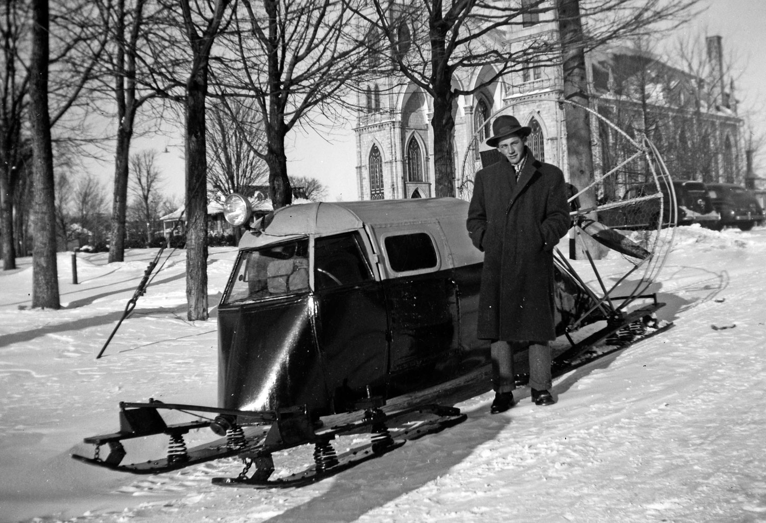 1948, Ste-Anne-de-la-Perade, Quebec. Is it a car, a Plane? No, it's a snowmobile! View full size.