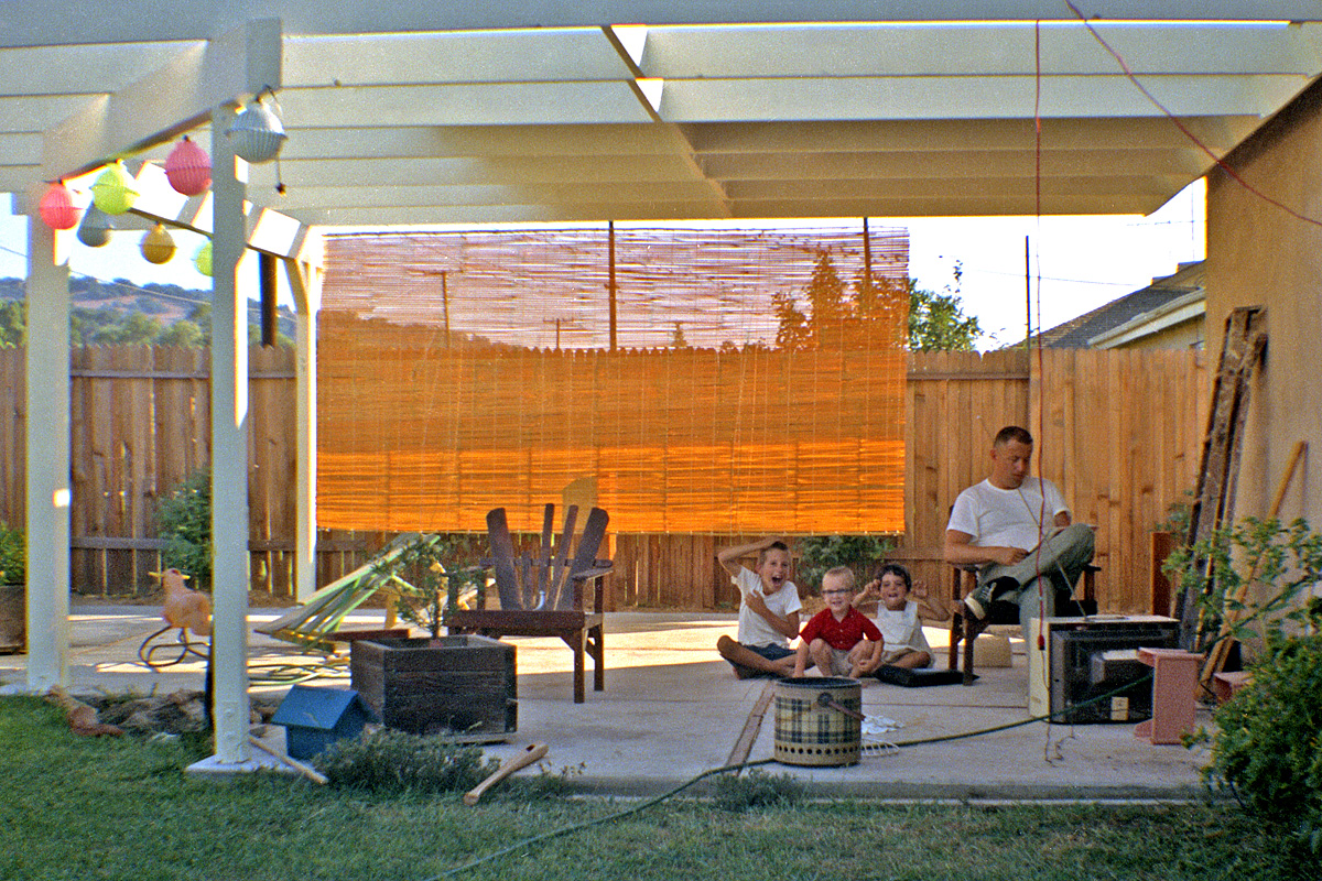 Earlier in the decade, Julius Shulman showed us life in the Hollywood Hills. Here's how real people lived 32 miles away in Diamond Bar in 1967. Step 1: haul TV set out to the patio. Step 2: kids follow automatically. My nephews, niece and brother-in-law in a section of a 2-1/4 square Kodacolor negative shot by my sister. View full size.