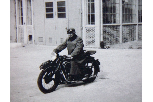 German soldier on BMW motorcycle in 1940.