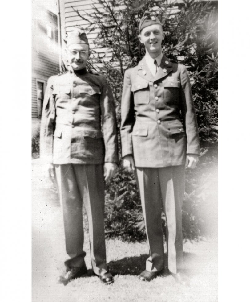 My grandfather and eldest uncle on the eve of my uncle's departure to the Pacific theater in WWII.  My grandfather served in France during WWI and was very proud to still fit into his uniform. Circa 1942, Connecticut. View full size.

