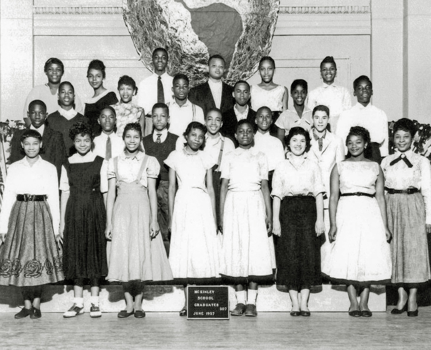 Taken in 1957, west side of Chicago. This was the home room group that graduated with me. I'm the little guy, 2nd row, 2nd from the right. Standing next to me on the left is Finn; we had most of the same classes together, including music, and played in the band together. View full size.