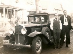 My father, Peter, on the right with someone possibly named Peter Schotik on a street in St. Paul, Minnesota, I suppose in the 1930s.  Why didn't people take the time to put a year on the back of the photo?  Possibly an Oakland car.