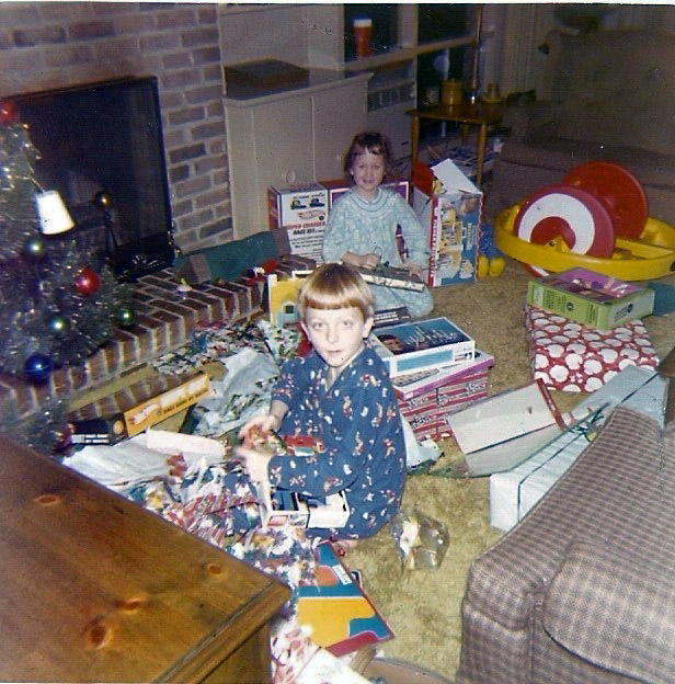 Louisville, 1968. Remember the Christmas morning frenzy?  I do. My sister and I have just scored two of the primo toys of the late 60's: the Hot Wheels Super Charger set for me, and the Krazy Kar for her.

(update: my sister tells me that it's a Krazy Kar, not a Big Wheel.)