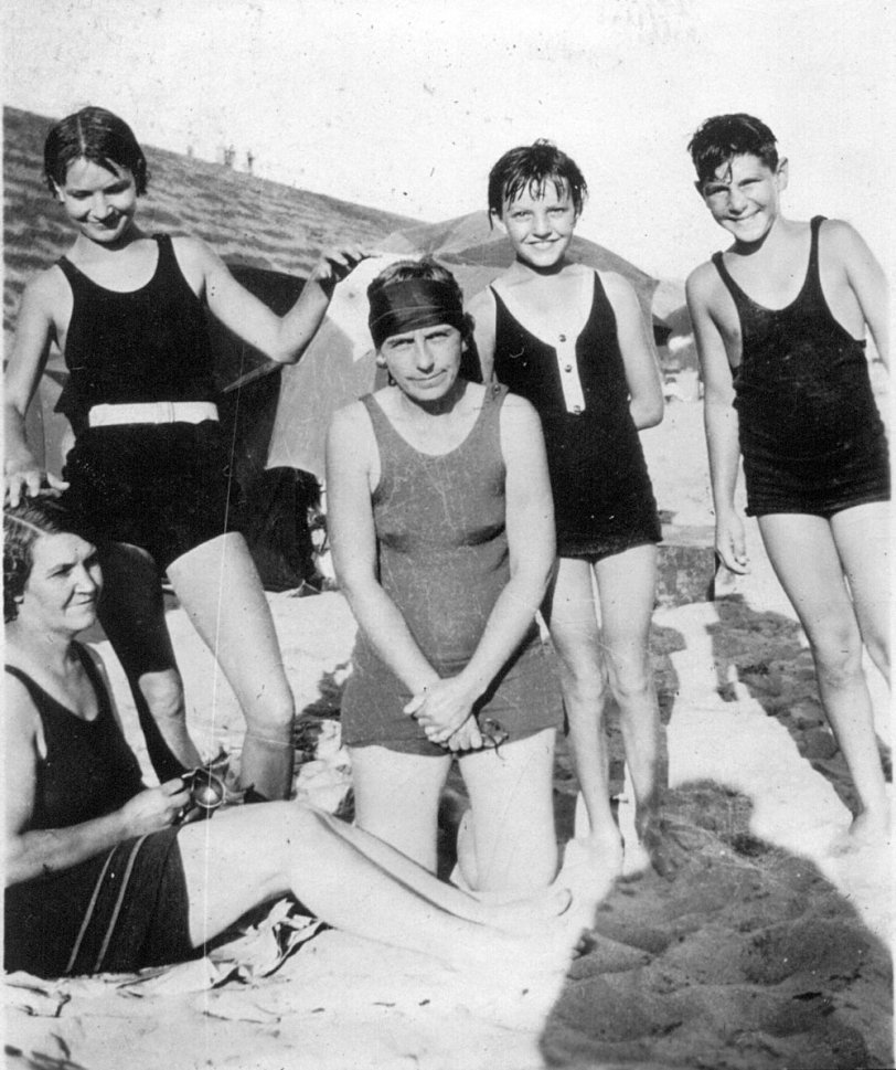 No caption on the back of the photo, but I am assuming friends or relatives of my paternal grandfather, 1930's. Likely taken in the San Pedro, CA area. They look a little cold but having fun at the beach. View full size.
