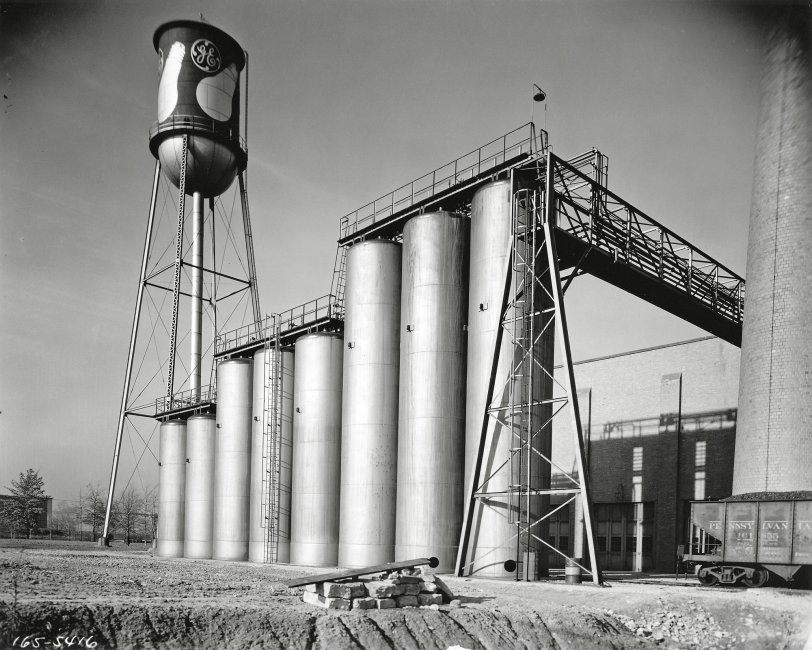 The tank farm, where chemicals are received and stored for use in the processing of tungsten metal, at a General Electric plant on the east side of Cleveland, Ohio. From a 5 x 7 glass negative taken shortly after the plant opened in the spring of 1932. View full size.
