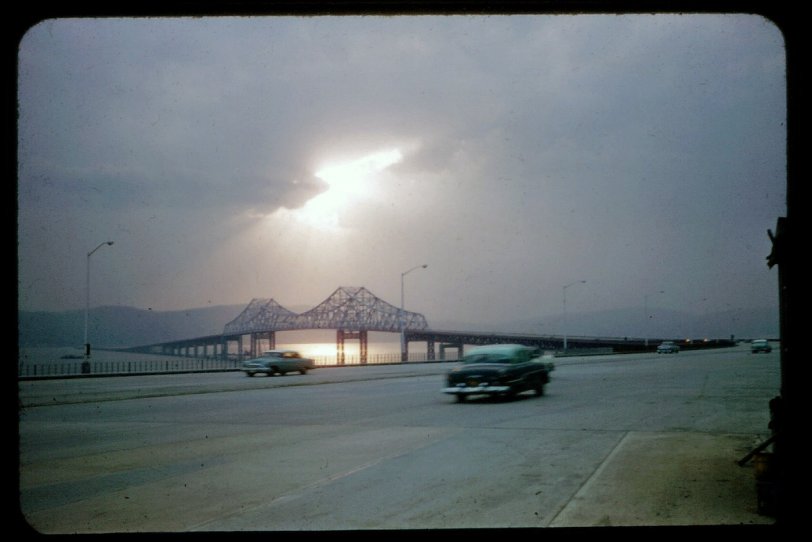 Nov. 29, 1957. Sun through the clouds, very nice, but the truly stunning sight for most modern New Yorkers would be a nearly-empty Tappan Zee Bridge.
