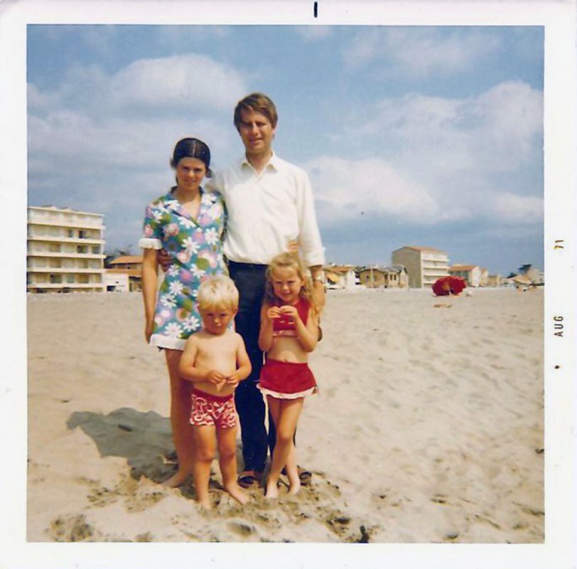 My first foreign holiday, Tenerife, Canary Islands. Picture says Aug 71 but it could well have been taken in 1970 and just sat in my parents camera for a year.  I think this is the only picture of all of us that I have ever seen. If it's 1971, Dad would be just 33, mum is 29, my sister Julie 5 and I've just gone 3. Dad died in 1999, so I can't ask him why he looks like he's halfway ready to go to work when we're on the beach.
