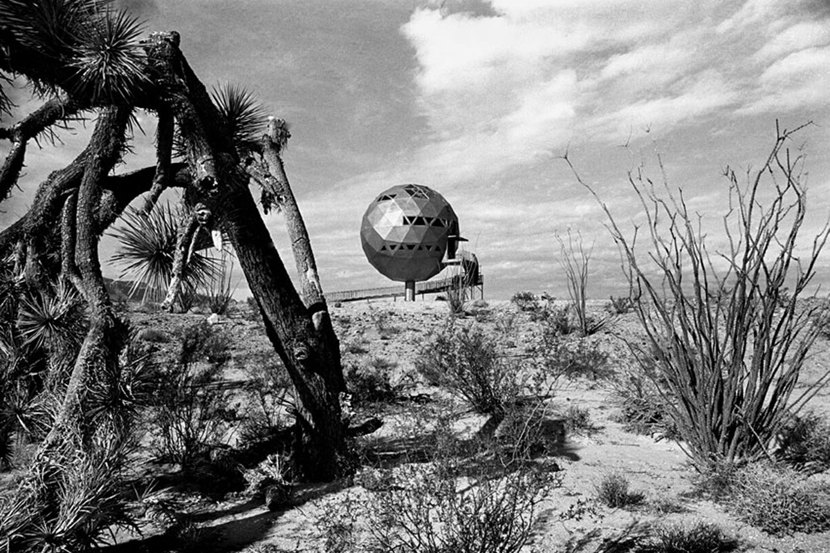 Yucca, Arizona this 40-ft diameter geodesic structure was built in the 1970's as the Dinosphere restaurant/night club for the "Lake Havasu Heights" real-estate debacle. It is now a private residence. I made this photo with a Nikon F and 24mm lens using 35mm Tri-X film sometime in December of 1975. View full size.