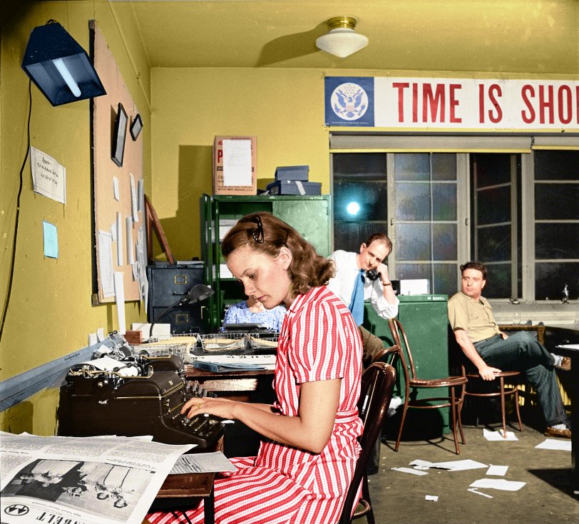 Colorized from this Shorpy original. It's a known fact: adding some color to the office increases your typed WPM! View full size.
