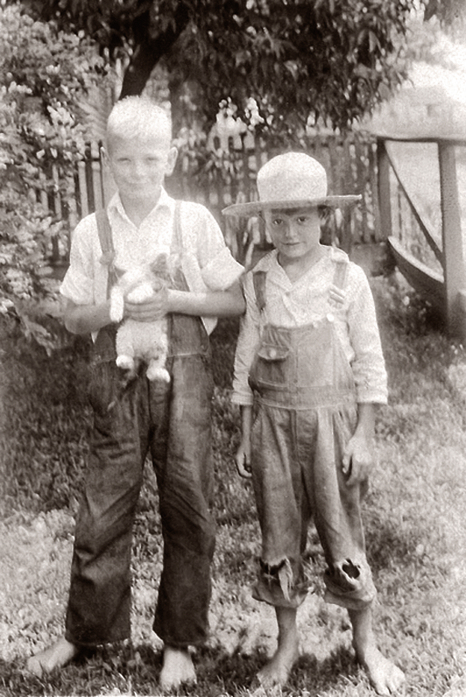Taken in the coal camp of Mabscott, Raleigh County, southern West Virginia, circa 1932. My dad (left) with his best friend and nextdoor neighbor. Scan of a treasured family photo.
