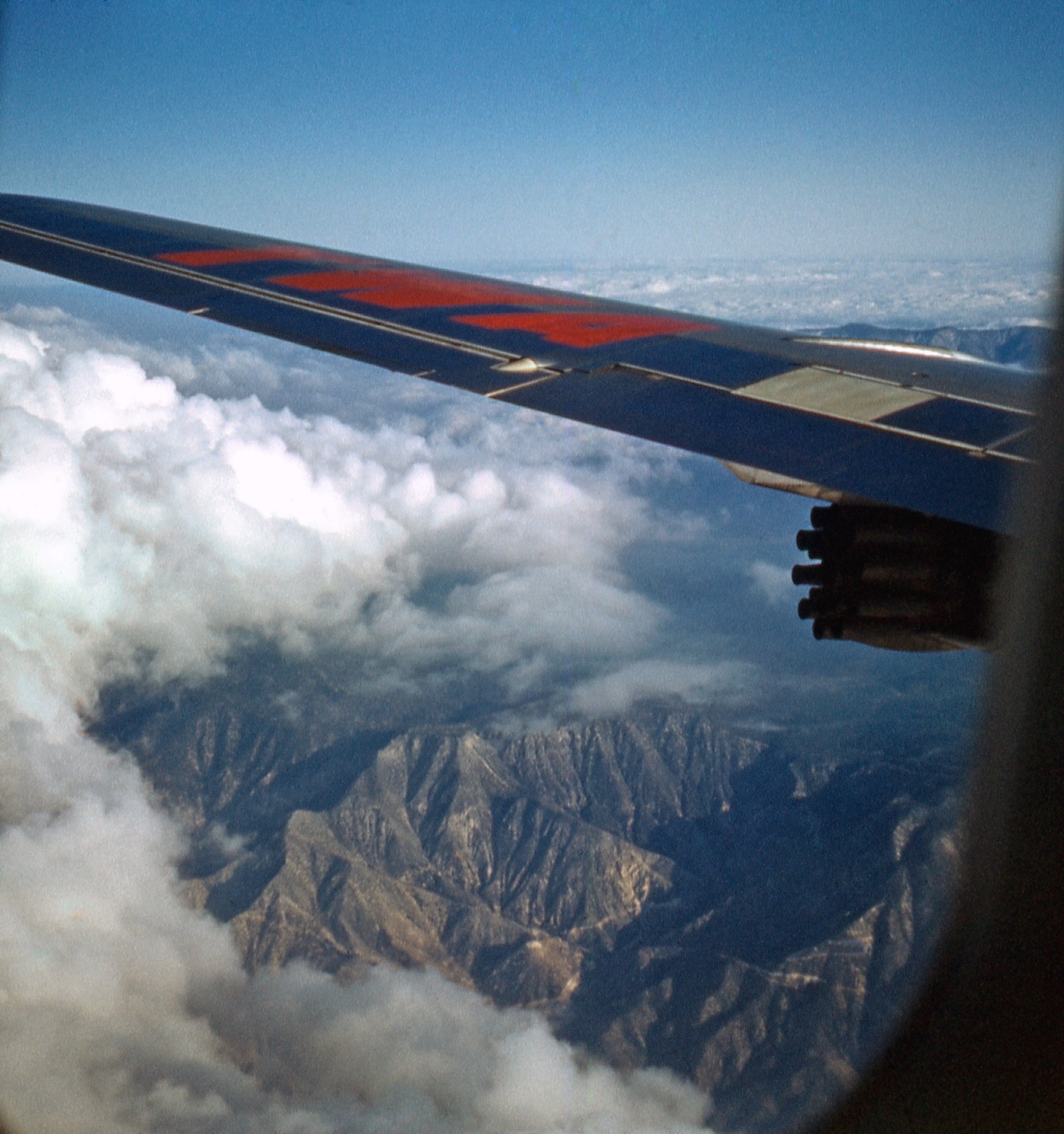 View out the window of a TWA Jet, probably early 60's.
This is from the same collection as the Alhambra Main St. photos. The terrain looks like Southern California. View full size.