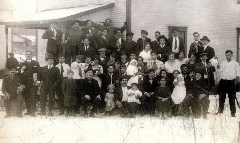 This was taken in the coal mining town of Lake Trade, Pa in 1921. My uncle Joe was the baby in the middle row. His parents are the lady third from his right. His father is the man pouring out of the white pitcher. They are my grandparents. View full size.
