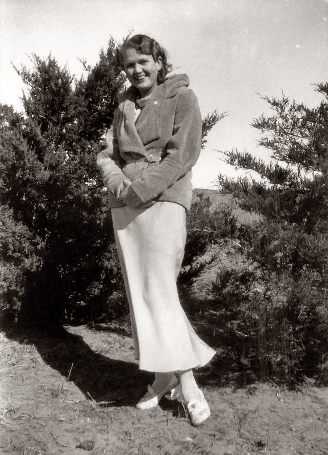 Violet Mae Phillips in the spring of 1934, at or near the family farm in Cherry County, Nebraska. A few months after this picture was taken, Violet was shot and killed by her father George.