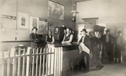 On the back is written: "Virginia &amp; Truckee RR, Interior of the ticket office. Virginia City, Nev 1898." View full size.
1898 Winchester calendarFound the calendar on the wall.
(ShorpyBlog, Member Gallery)
