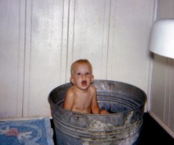 No, this is not Pie Town. It's my nephew Jimmy taking a bath at our Russian River summer place in East Guernewood, California in 1961. View full size.
(ShorpyBlog, Member Gallery, Kids, tterrapix)