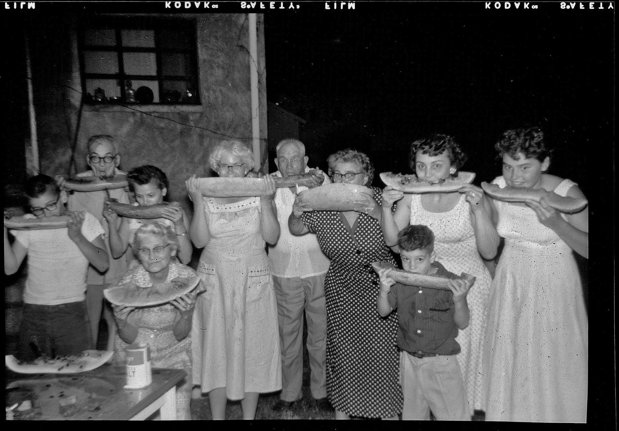 1957-1958. All relatives from my father's side.  Far left is my aunt Judy (as seen in my previous post "Uncle Butch and Aunt Judy"), next to her is my grandmother, below her is my father Roger, and the far left of the negative is my uncle Jack (as seen in another post with the shark jaws). View full size.