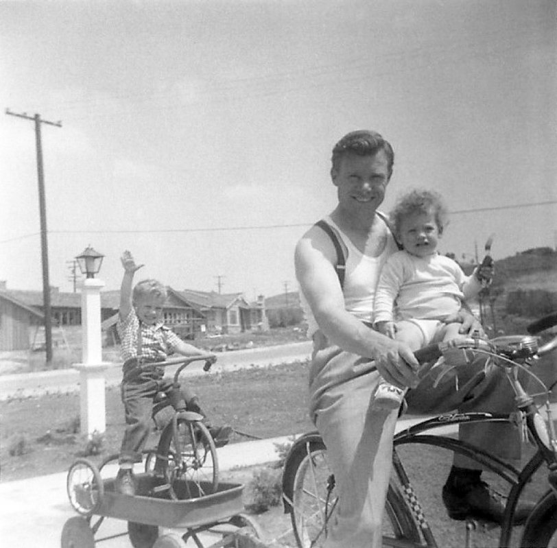 The birth of a neighborhood 1955. This is Casa Grande which runs parallel to Merced in West Covina, California. The picture is facing northeast from the house Greg Herbert's father just built for. It is less than 100 yards south of where Hollencrest would be built. One of those two houses you see being built across the street is where the Sanborn (Sanborn Theaters) family would eventually be raised. Photo taken by Mary Herbert, 1955. View full size.
