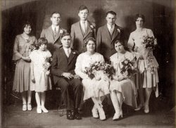 My grandparents' wedding. Not sure of the year. Pictured are my grandfather and grandmother, three of his brothers and one of their wives. Also Granddad's two daughters from his first marriage. He was a widower.