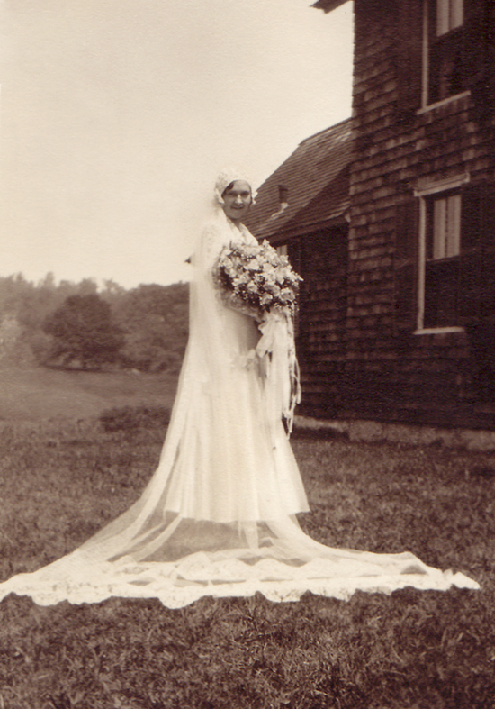 Rose Boneville Chagnon on her wedding day in 1930, in front of her home on Maple Ave in Uncasville, Connecticut