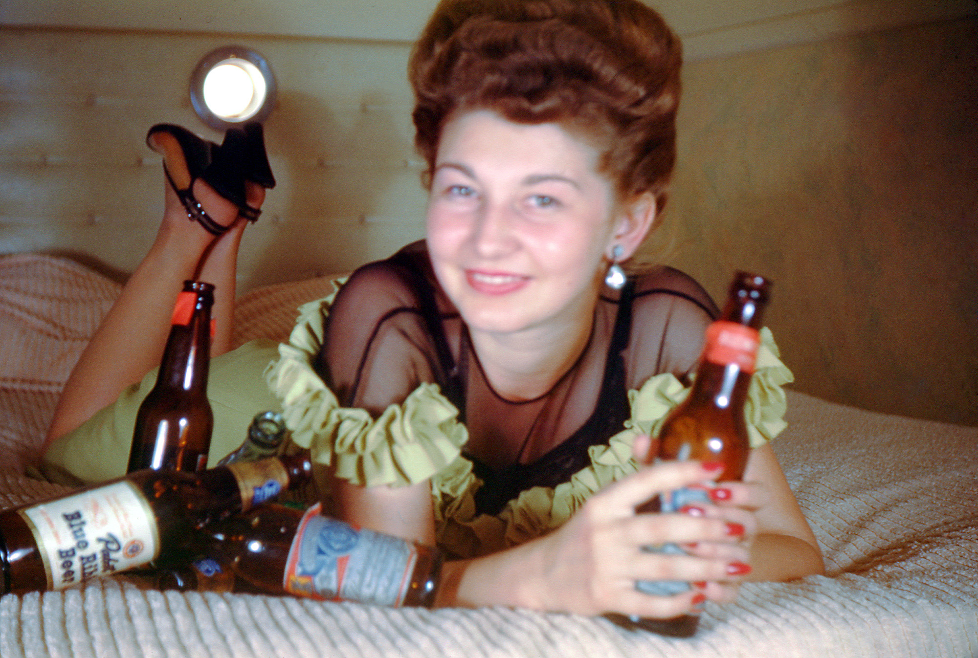 I have no idea what this is about - make up your own story. A found Kodachrome slide from the same metal box that the Women Who Smoke came from. Probably early 1950s. View full size.