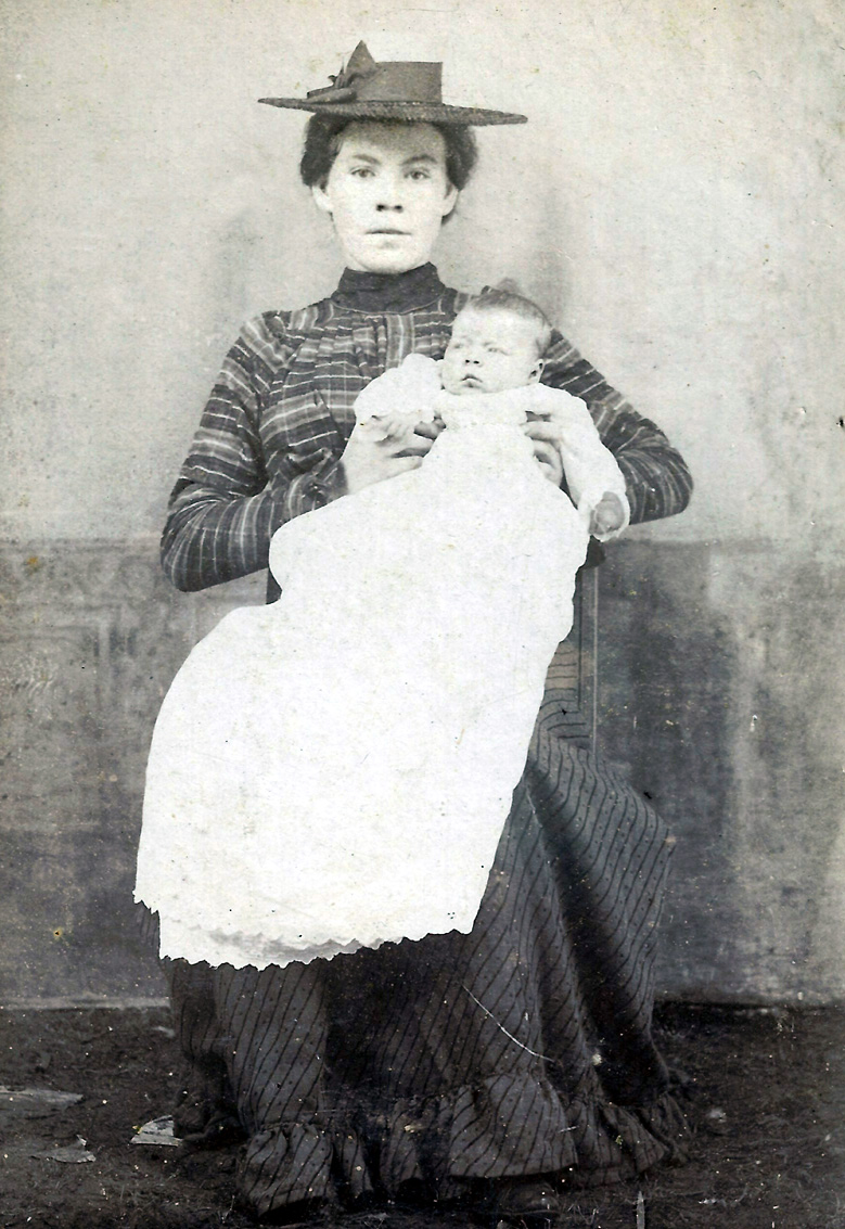 This is my 19-year-old Aunt Willie May Shannon Huffines taken in Paragould, Arkansas shortly after the birth of her son Morris in 1901.  Willie May died in 1910.  We have another picture of Morris that suggests that he died at one or two years of age from the measles. View full size.
