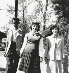 My mother, then named Arlene Weinstein and called "Rusty" by her friends because of her rust red hair, poses with two of her Brooklyn neighbors on a street near their home. She is in the center, dressed to the nines, as she always was. Back of photo says Rubie Cohen, 953 45th St, and Jack Katzman, 942 45th St, in writing that dates to the time of the picture, and Doris Landman, Arlene, and Rube Cohen in writing added by my mother a half century later. My guess is there are actually four teens hanging out in Brooklyn on this mid 1940's day. Perhaps Jack is taking the picture. Mostly I like this picture for the car (which did not belong to any of them or their families). View full size.
(ShorpyBlog, Member Gallery)