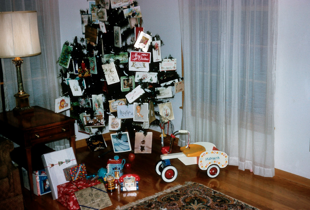 This was taken the night before Christmas in 1966, the year my parents moved to Hermitage, PA. I was a year and a half old then. Those old Fisher-Price phones are being brought back thanks to Toy Story 3. View full size.